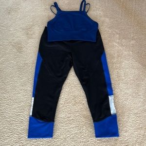 Zella High Waist blue/black cropped leggings with blue sports bra.